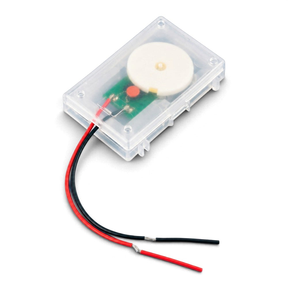 Electronic melody module in translucent plastic housing with red and black connecting leads